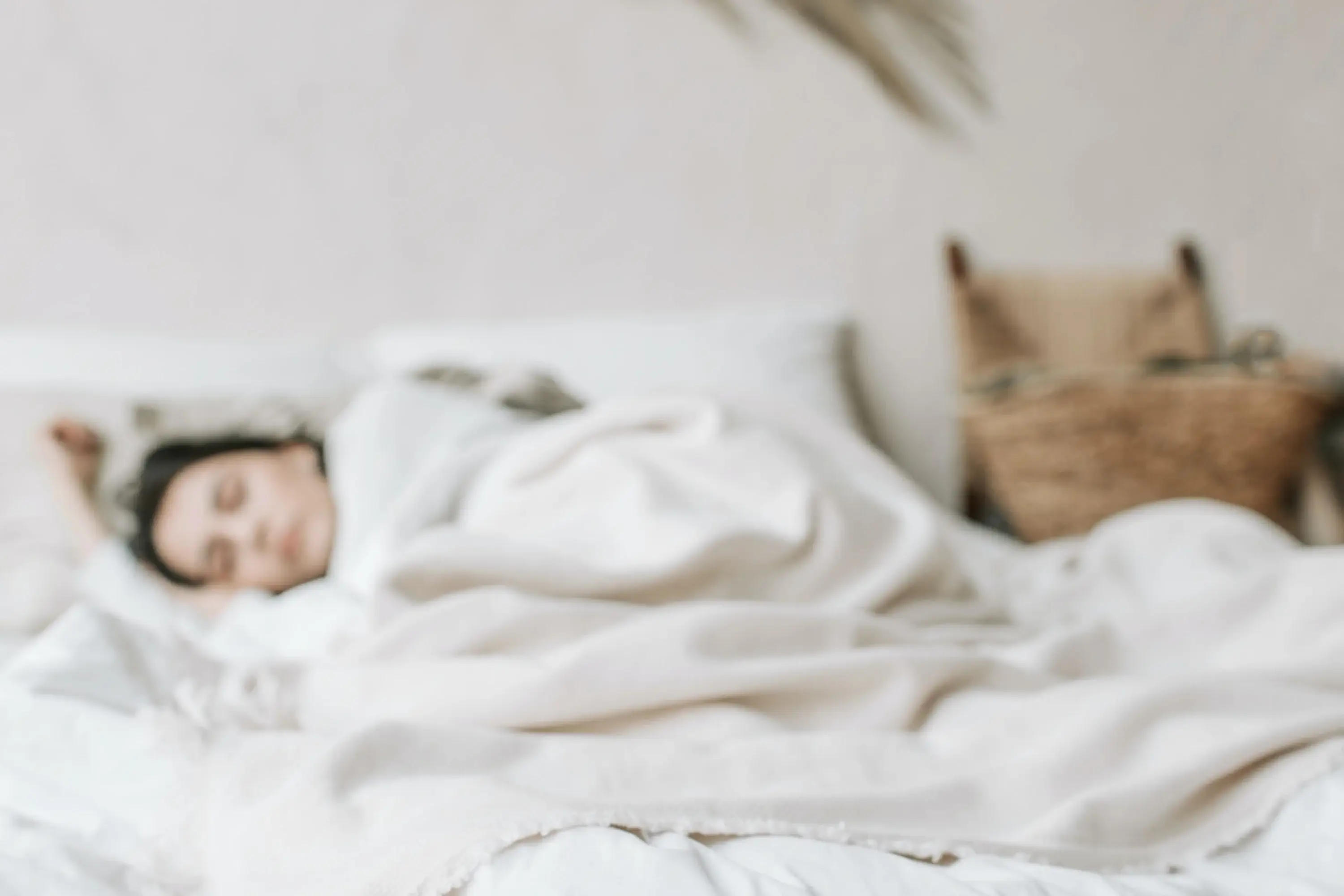 a woman laying in bed